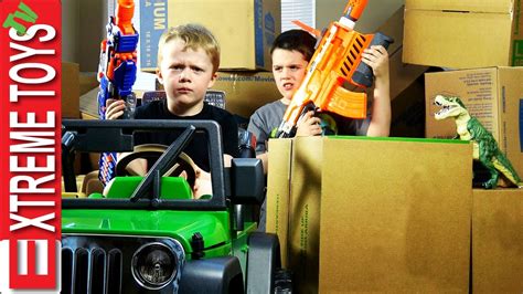 Nerf Gun Cardboard Box Battle! Cole Attacks Ethan with Nerf .